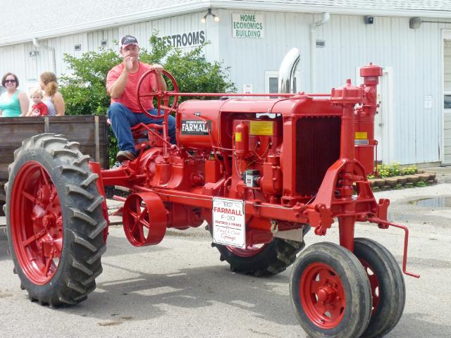 1937 Red Farmall F-30 pulling a wagon in Sunday's Parade at the fair